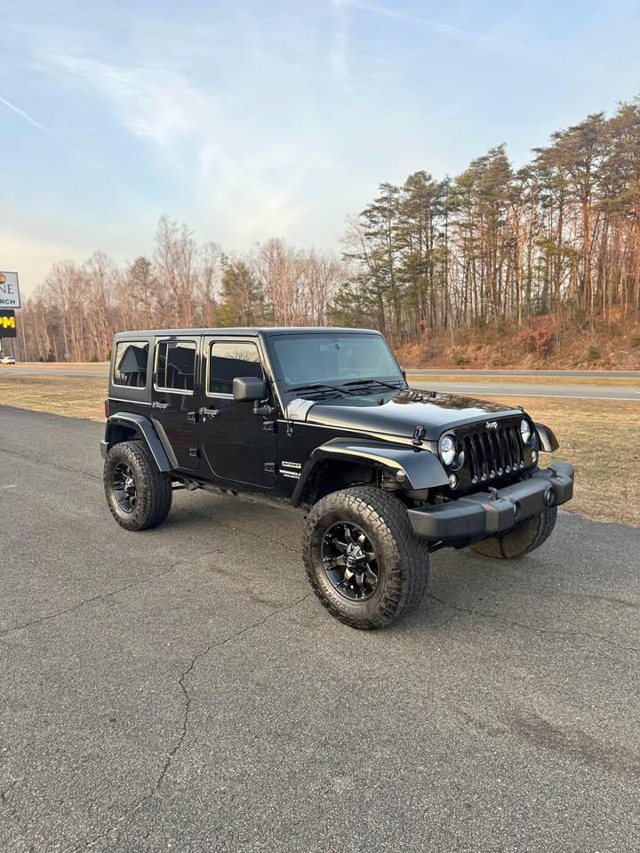 2014 Jeep Wrangler Unlimited Sport 4WD for sale by dealer