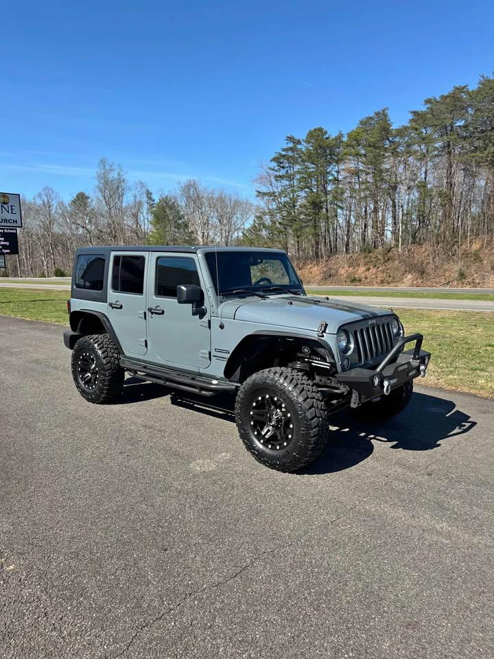 2014 Jeep Wrangler Unlimited Sport 4WD for sale by dealer